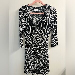 EUC animal print v-neck dress with ruffle details; flattering A-Line cut; size L